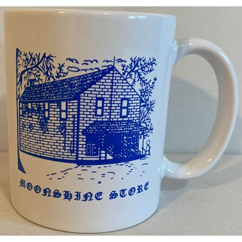 Vintage Moonshine Store Ceramic Mug. White Blue Prohibition Collectible